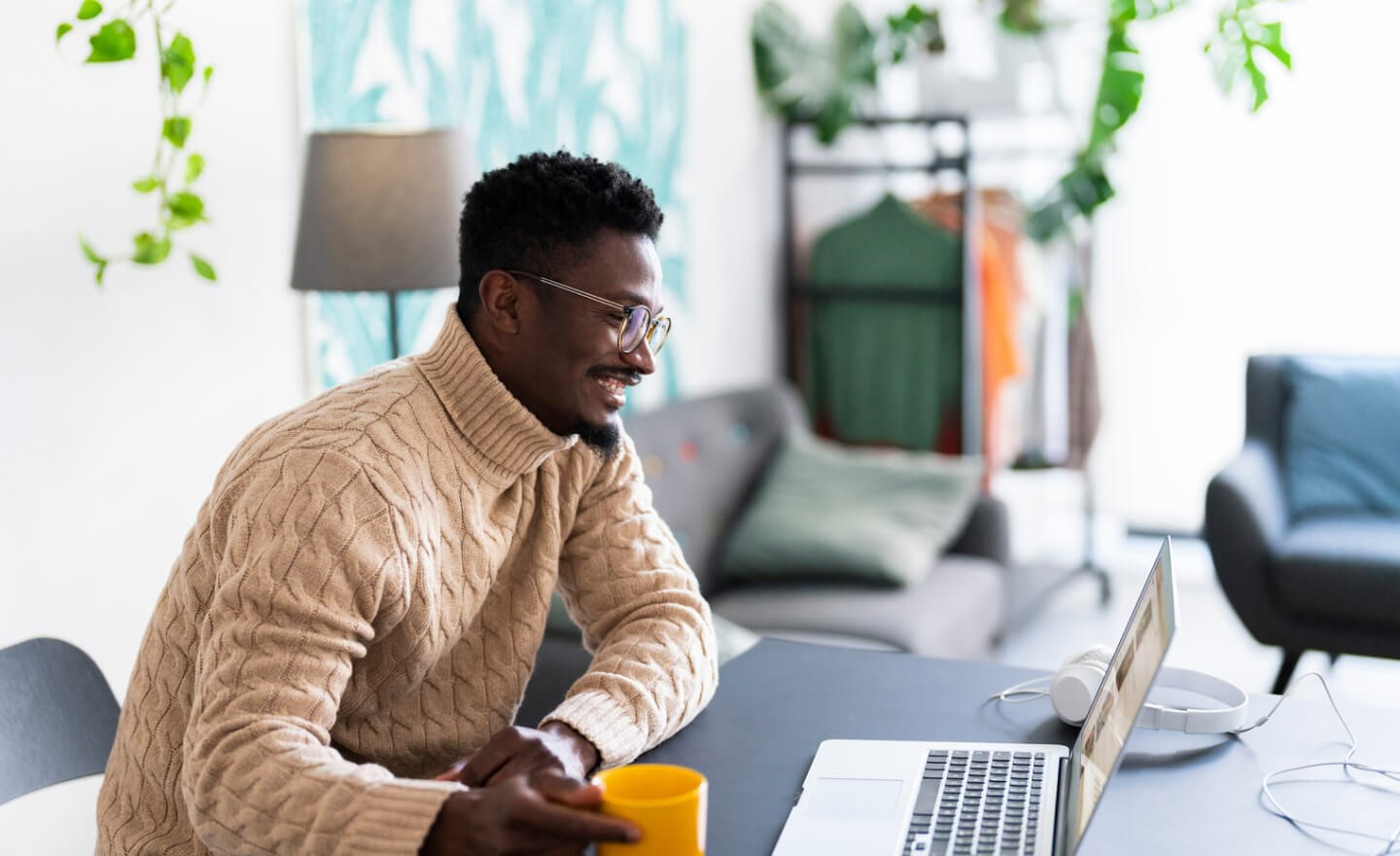 Man on video call in bright office