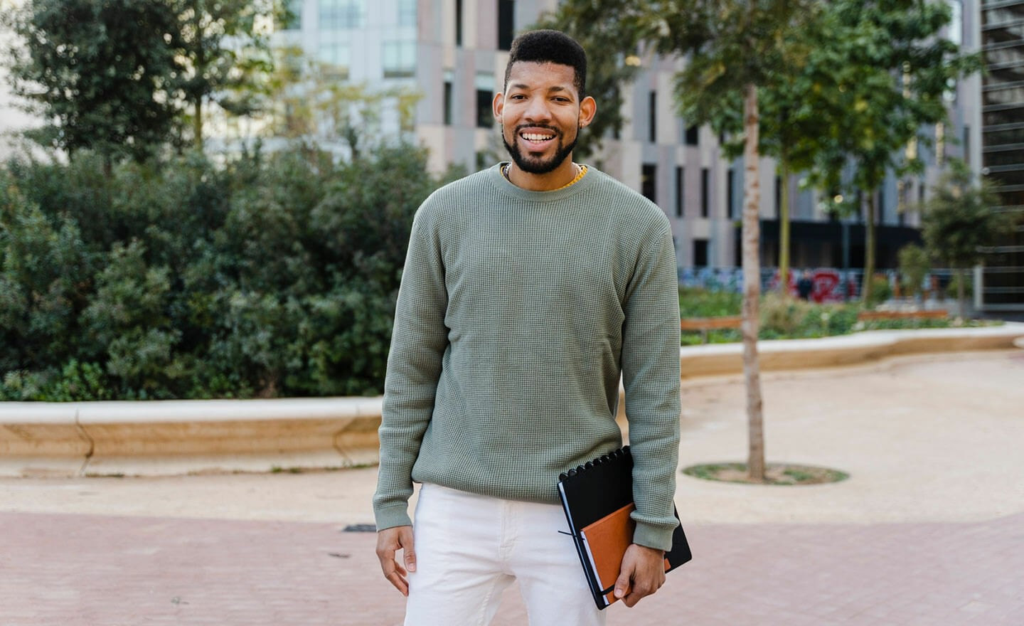 Portrait of a happy person outside office