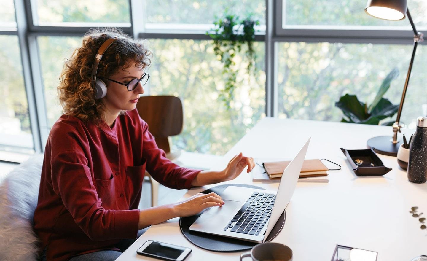 Woman working on computer at home