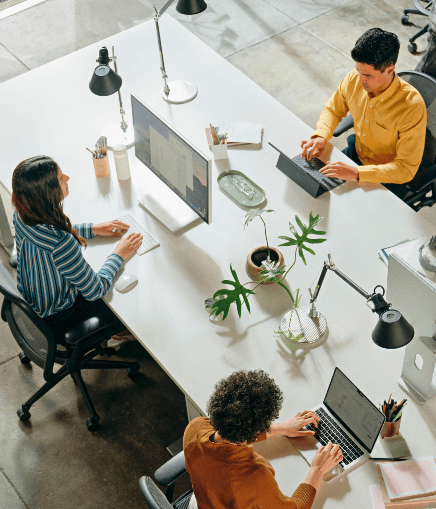 Group of coworkers in office space warm tones