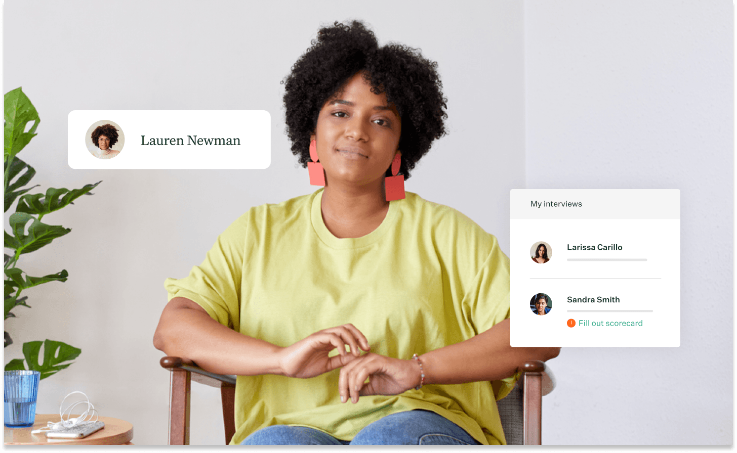 Photo of a woman in a yellow shirt sitting near a plant